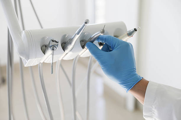 Professional Wisdom Tooth Removal technician working in Pompano Beach, FL